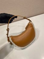 Prada Arqué small shearling shoulder bag