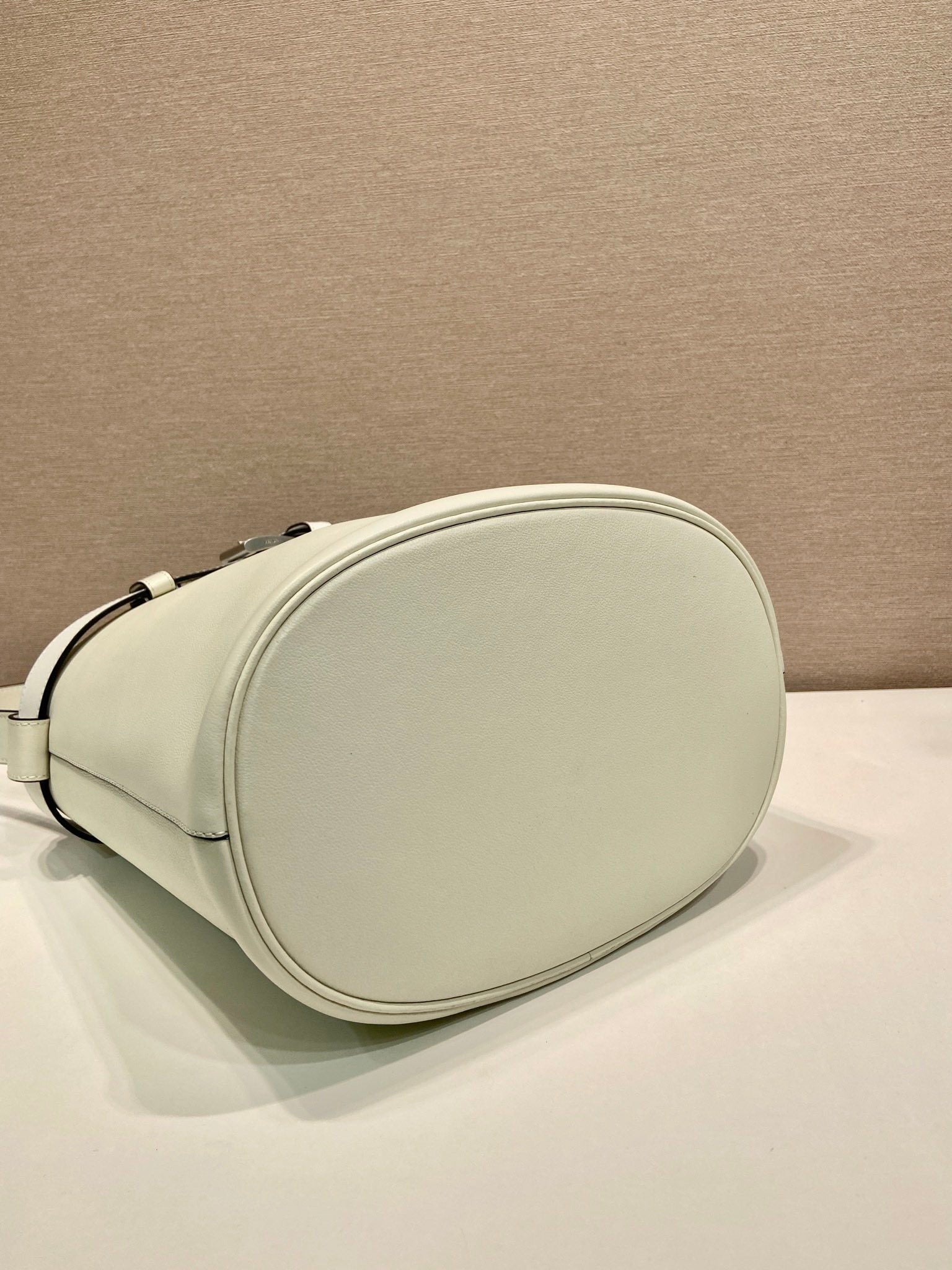 Prada Buckle leather bucket bag with belt