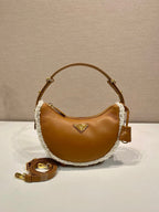 Prada Arqué small shearling shoulder bag