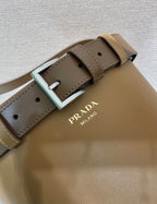 Prada Buckle leather bucket bag with belt