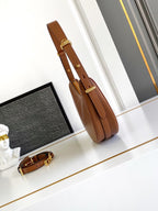 Prada Arqué small leather shoulder bag