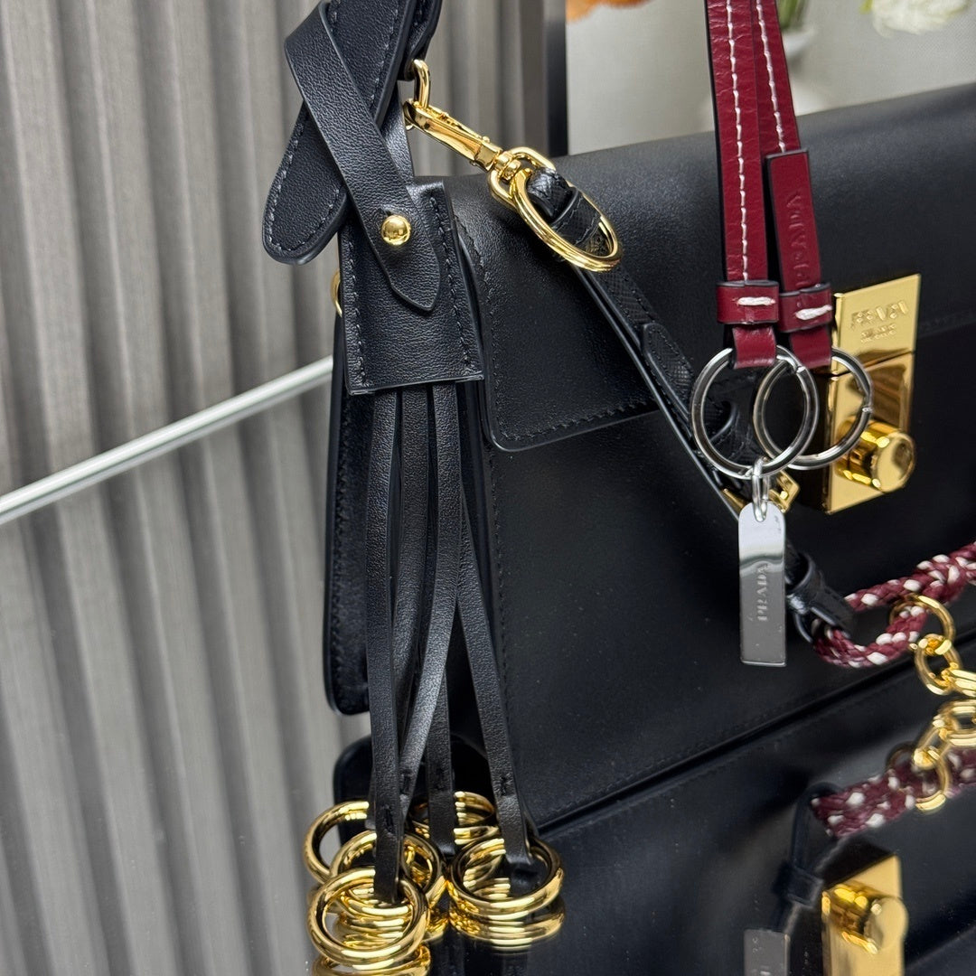 Prada Soft Sound small leather shoulder bag with charms