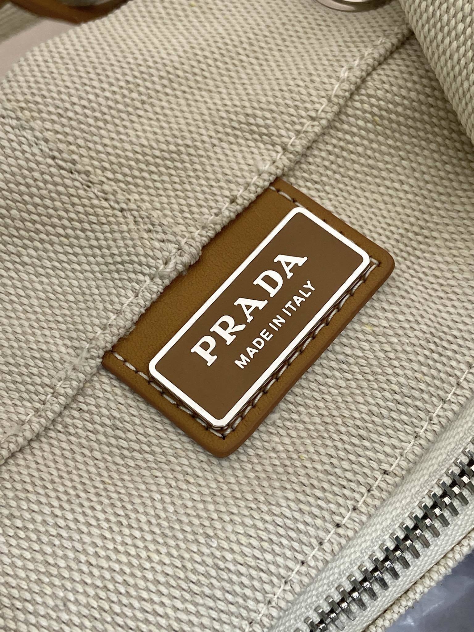 Prada linen blend drawstring duffel bag