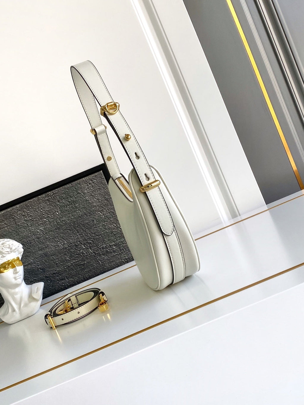 Prada Arqué small leather shoulder bag