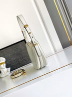 Prada Arqué small leather shoulder bag