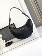 Prada Arqué small leather shoulder bag