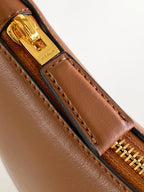 Prada Arqué small leather shoulder bag