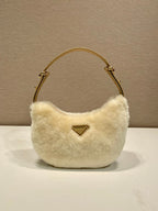 Prada Arqué shearling and leather shoulder bag