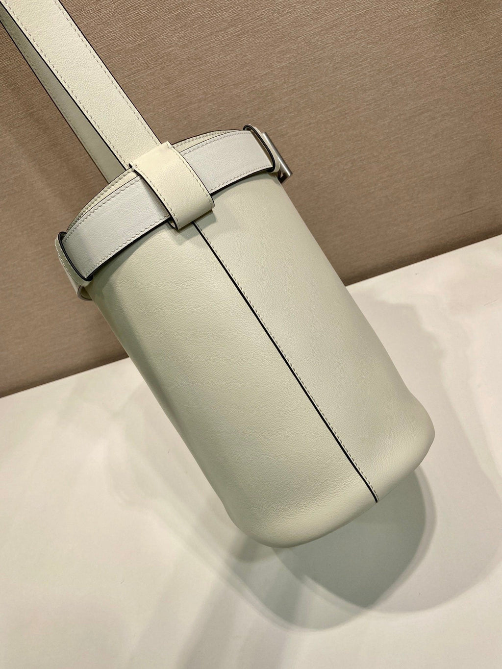 Prada Buckle leather bucket bag with belt