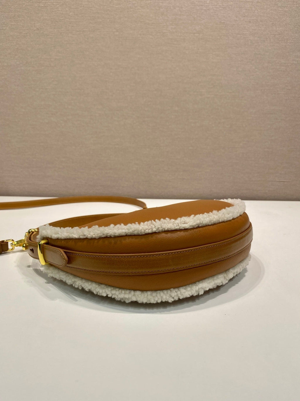 Prada Arqué small shearling shoulder bag