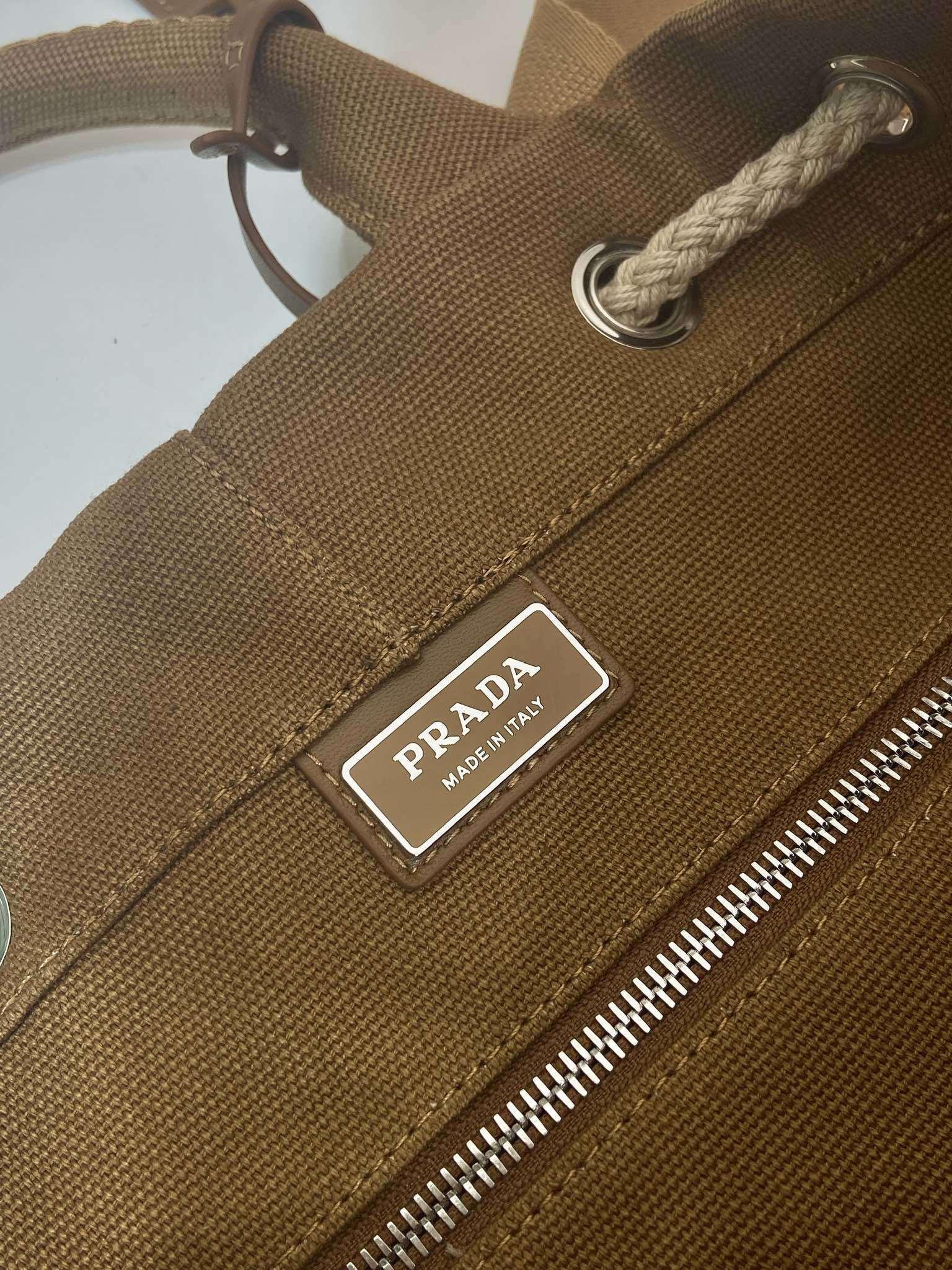 Prada canvas drawstring duffle bag