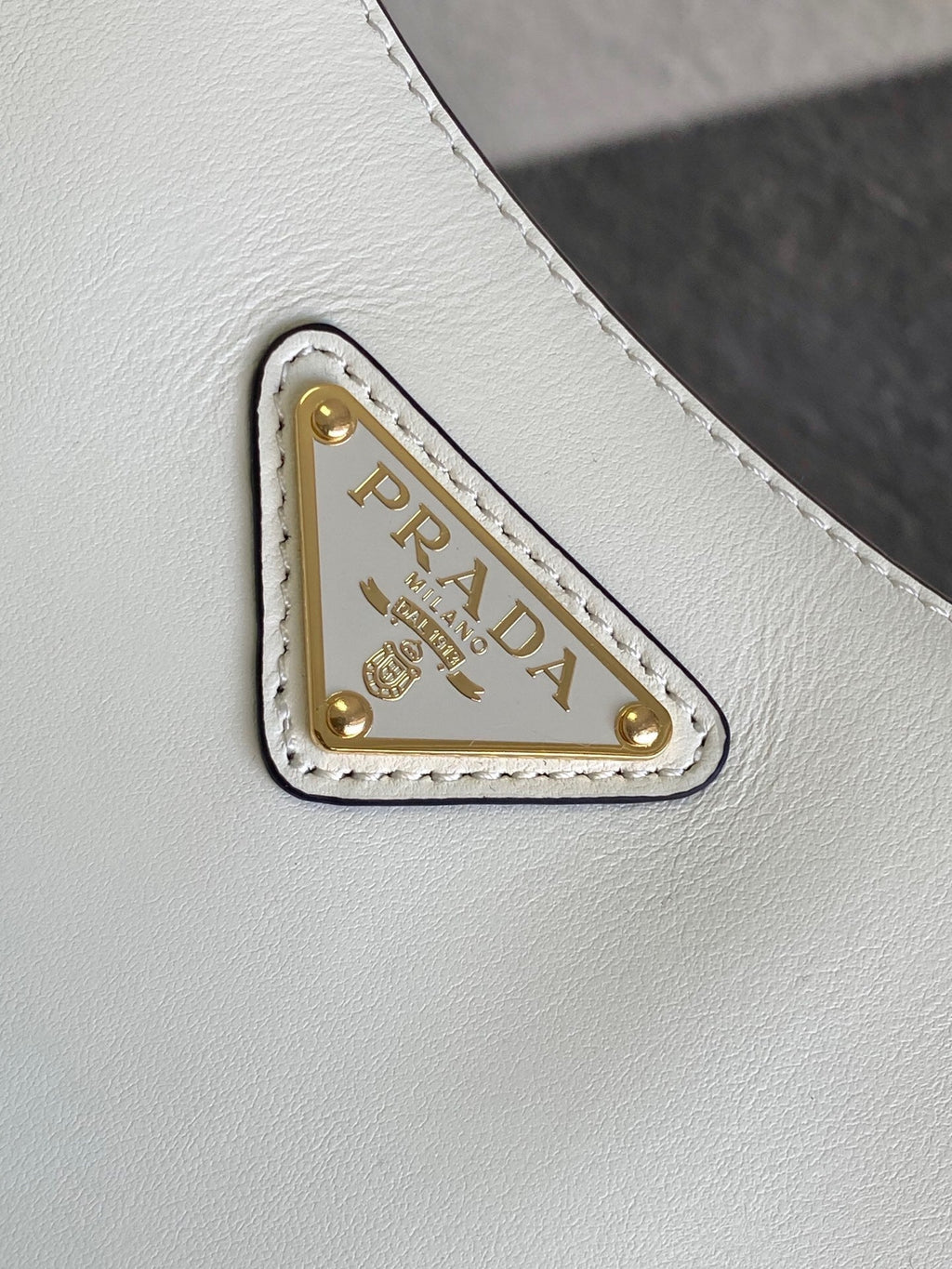 Prada Arqué small leather shoulder bag
